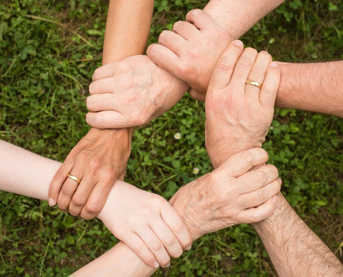 Hands joined together, representing professional membership