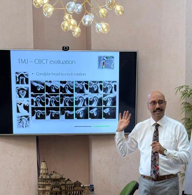 Dr. Nayak presenting a TMJ CBCT evaluation talk